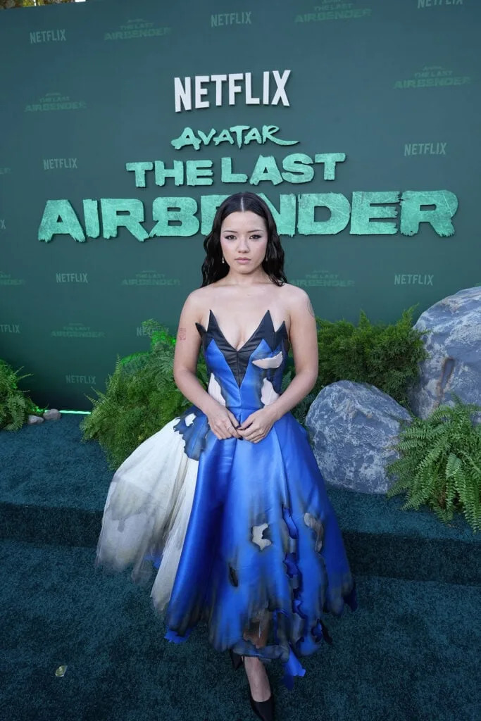 Elizabeth Yu wears a blue Moschino gown to the Avatar: The Last Airbender Season 2 premiere in Los Angeles.