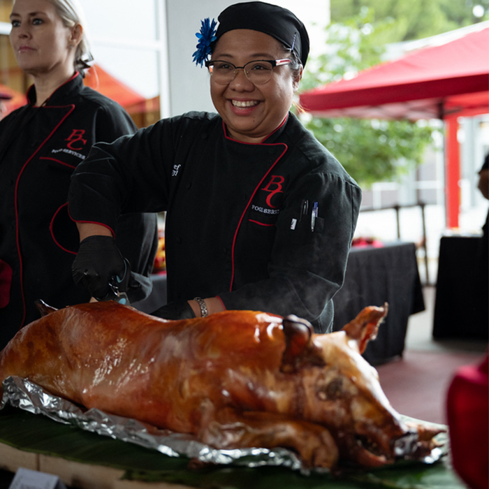 BC food server and large roast pig