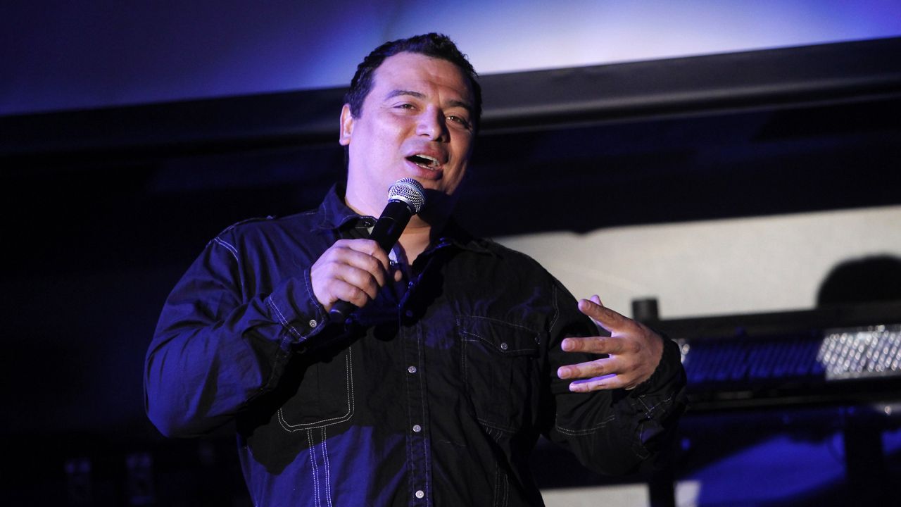 Comedian Carlos Mencia performs during the Tr3s: MTV, Musica y Mas Upfront on Wednesday, May 19, 2010 in New York. (Jason DeCrow/AP Images for Tr3s: MTV, Musica y Mas)