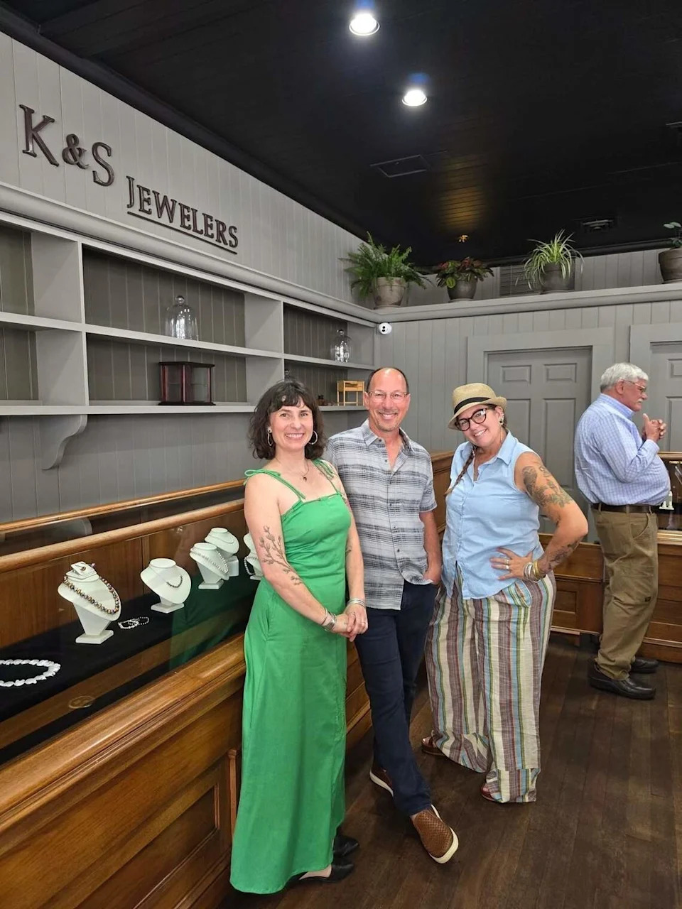 Katy Jayne and Susan Rabinovitz with Howard Skalet at the K&S Jewelers’ grand opening on Friday, June 5, 2026. Jayne said Skalet “passed the torch” to the duo behind K&S Jewelers, as Skalet previously owned the business’s predecessor, Skalet Family Jewelers.