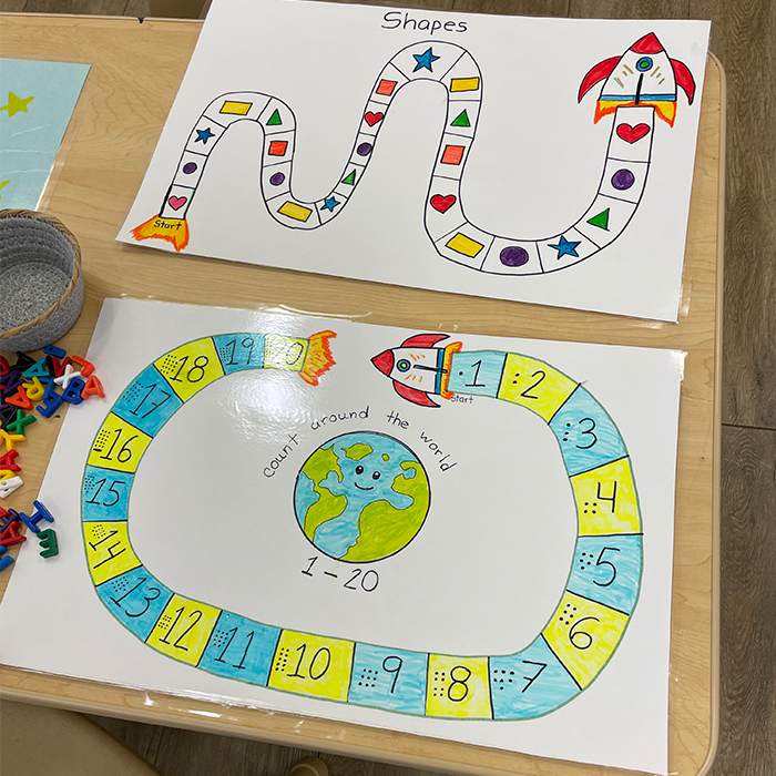 two space-themed games sitting on a table