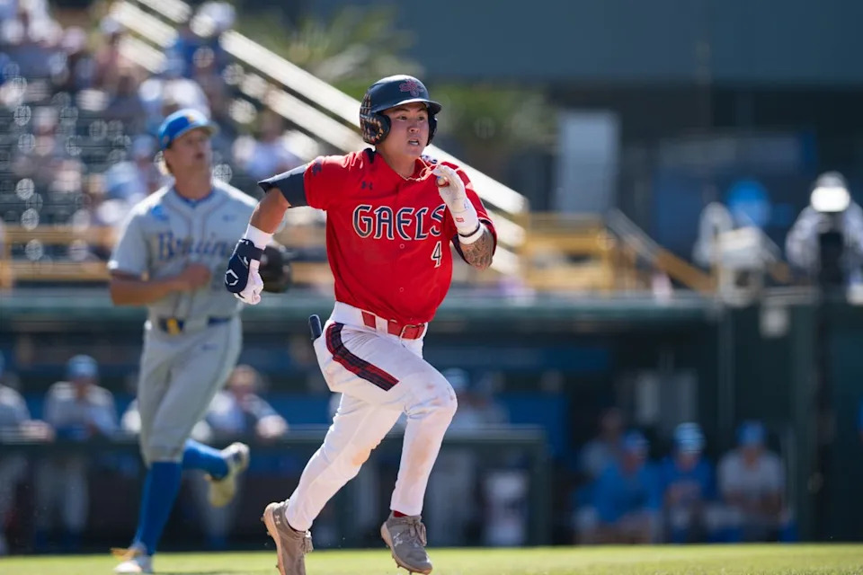 Saint Mary's College infielder Cody Kashimoto (4) runs to first base after making contact during an NCAA regional championship elimination game between the Saint Mary's College Gaels and UCLA Bruins on May 31, 2026 at Jackie Robinson Stadium in Los Angeles Calif.