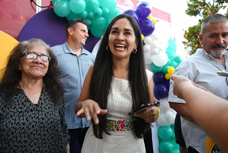 Fresno City Council District 7 candidate Ariana Martinez Lott, center, celebrates at a campaign gathering Tuesday night, June 2, 2026 in Fresno.