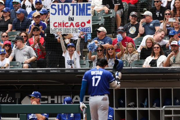 Dodgers two-way player Shohei Ohtani (17) walks to the dugout after striking out during the third inning against the White Sox at Rate Field June 14, 2026 in Chicago. (Armando L. Sanchez/Chicago Tribune)