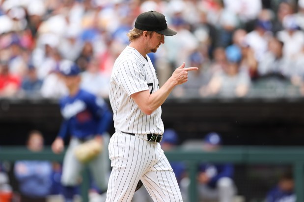 White Sox pitcher Erick Fedde (47) points while walking to the dugout after pitching during the fourth inning against the Dodgers at Rate Field June 14, 2026 in Chicago. (Armando L. Sanchez/Chicago Tribune)