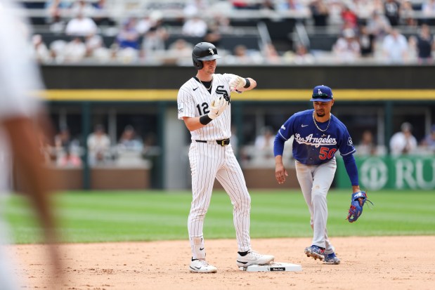 White Sox shortstop Colson Montgomery (12) stands at second base after hitting a double during the fourth inning against the Dodgers at Rate Field June 14, 2026 in Chicago. (Armando L. Sanchez/Chicago Tribune)