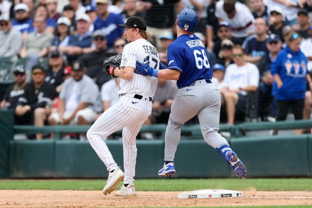 Dodgers catcher Dalton Rushing (68) gets tagged out by White Sox pitcher Erick Fedde (47) during the fifth inning at Rate Field June 14, 2026 in Chicago. (Armando L. Sanchez/Chicago Tribune)