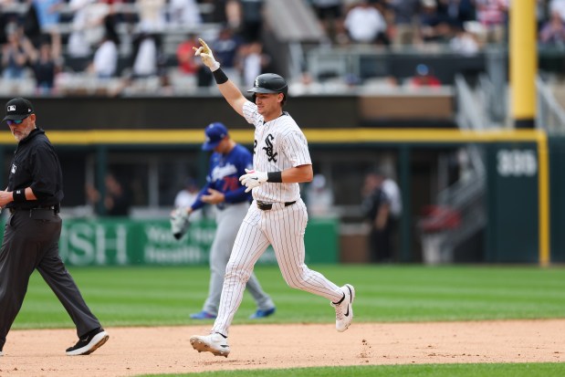 White Sox shortstop Colson Montgomery (12) runs the bases after hitting a two-run homer during the sixth inning against the Dodgers at Rate Field June 14, 2026 in Chicago. (Armando L. Sanchez/Chicago Tribune)