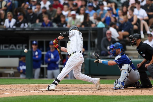 White Sox second baseman Chase Meidroth (10) hits a two-run homer during the sixth inning against the Dodgers at Rate Field June 14, 2026 in Chicago. (Armando L. Sanchez/Chicago Tribune)
