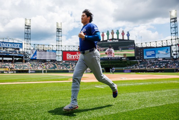 Dodgers two-way player Shohei Ohtani (17) warms up on the field before the Dodgers play the White Sox at Rate Field Sunday June 14, 2026 in Chicago. (Armando L. Sanchez/Chicago Tribune)
