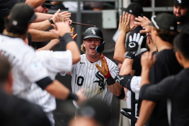 White Sox second baseman Chase Meidroth (10) celebrates in the dugout after hitting a two-run homer during the sixth inning against the Dodgers at Rate Field June 14, 2026 in Chicago. (Armando L. Sanchez/Chicago Tribune)