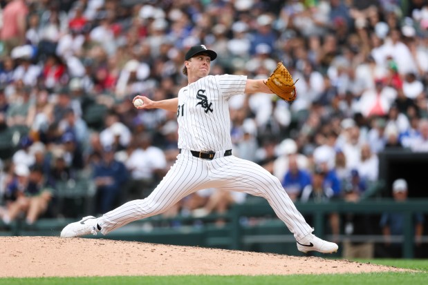 White Sox pitcher Grant Taylor (31) pitches during the eighth inning against the Dodgers at Rate Field June 14, 2026 in Chicago. (Armando L. Sanchez/Chicago Tribune)