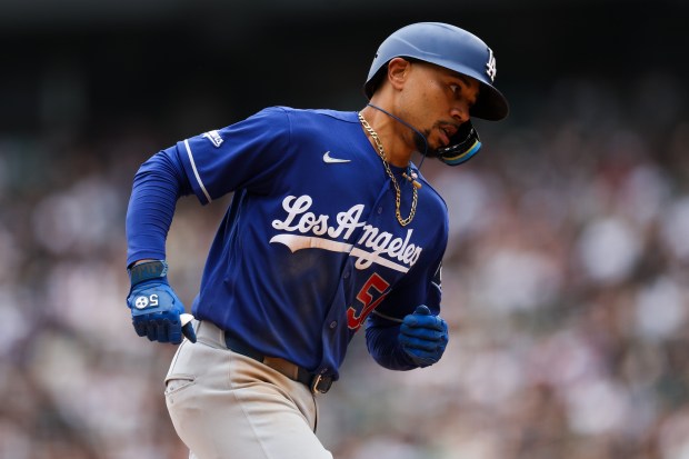 Dodgers shortstop Mookie Betts (50) runs the bases after hitting a solo-homer during the eighth inning against the White Sox at Rate Field June 14, 2026 in Chicago. (Armando L. Sanchez/Chicago Tribune)