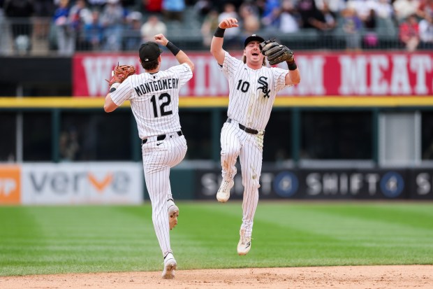 Chicago White Sox shortstop Colson Montgomery celebrates with second baseman Chase Meidroth after the White Sox defeated the Los Angeles Dodgers, 4-6, at Rate Field on June 14, 2026 in Chicago. (Armando L. Sanchez/Chicago Tribune)