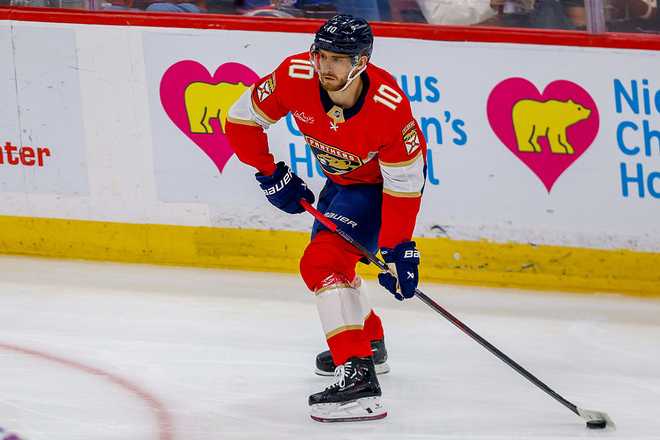 NHL: APR 13 Rangers at Panthers SUNRISE, FL - APRIL 13 : Florida Panthers left wing A.J. Greer (10) controls the puck during a NHL game between the New York Rangers and the Florida Panthers on April 13, 2026 at Amerant Bank Arena in Sunrise, FL.(Photo by Chris Arjoon/Icon Sportswire via Getty Images)