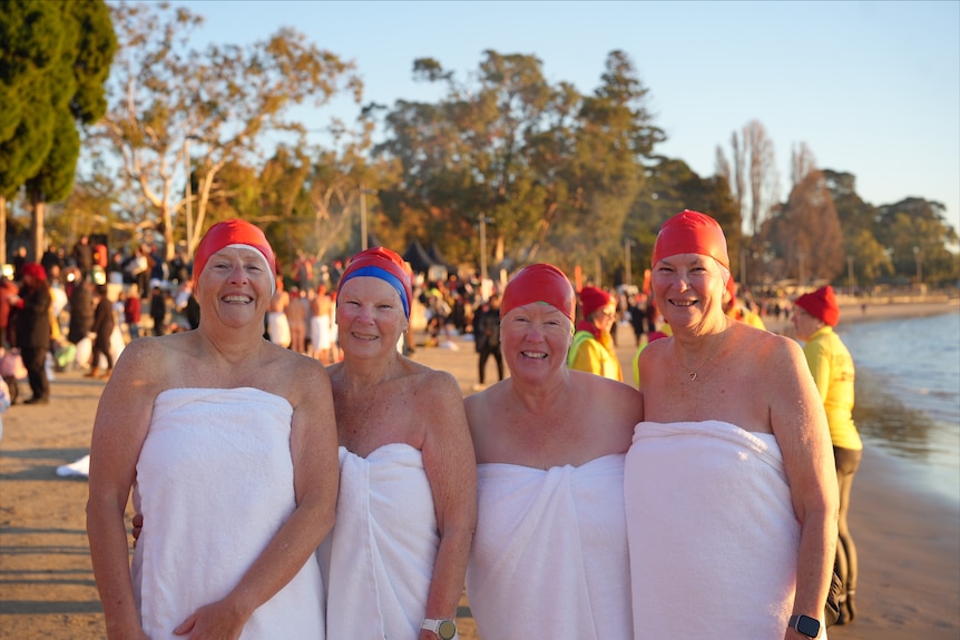 four women stand together, including Pauline Askin, left.
