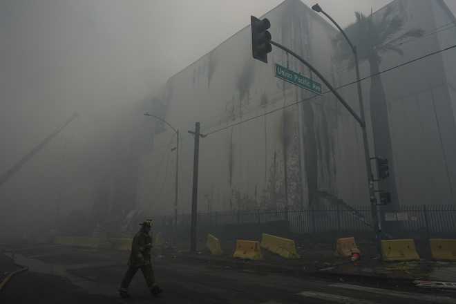 Warehouse fire Smoke from a warehouse fire fills the air in the Boyle Heights neighborhood of Los Angeles, Sunday, June 21, 2026.