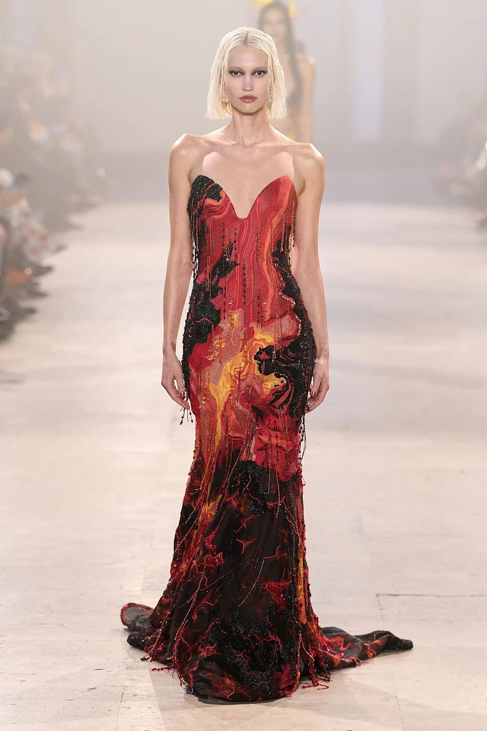 Model walks the runway in Rahul Mishra Spring 2026 Couture molten embroidered gown.