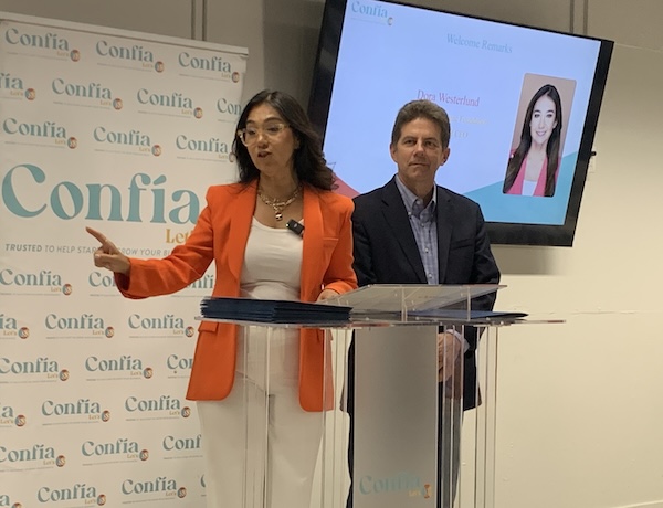 Fresno Area Hispanic Foundation CEO Dora Westerlund and Fresno County Supervisor Brian Pacheco deliver welcoming remarks before presenting grants during the Mobile Food Vendor Grant Ceremony.