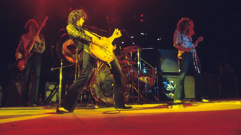 John Paul Jones, Jimmy Page and Robert Plant of the English heavy rock band Led Zeppelin performing on stage in 1977. Jeffrey Mayer/WireImage