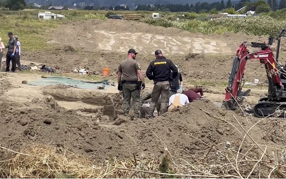 Investigators conduct excavation work at at the shelter