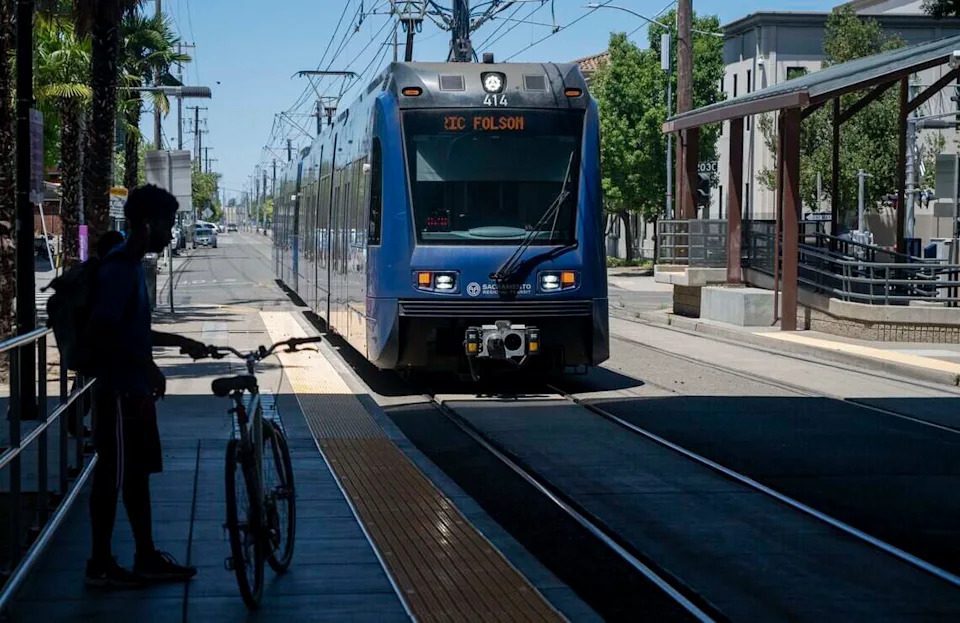 Passengers wait to board the light rail train at the 29th Street station in Sacramento on Wednesday, June 10, 2026. Sacramento Regional Transit will be making a change late this summer to the speakers that emanate the warning bell sound on the new S700 low-floor light rail vehicles.
