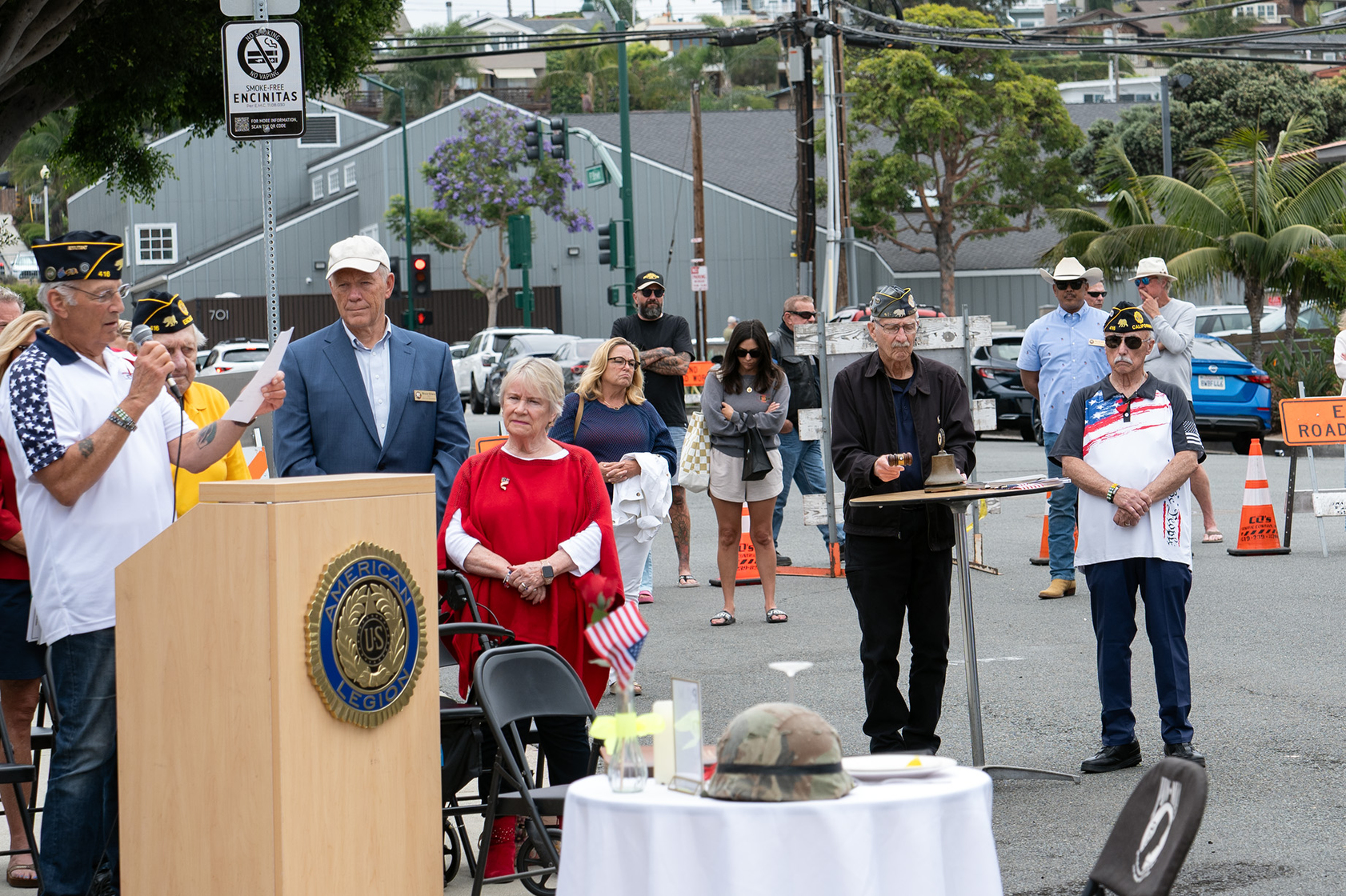 Post Adjutant Dennis LeLillo performs the roll call of absent...