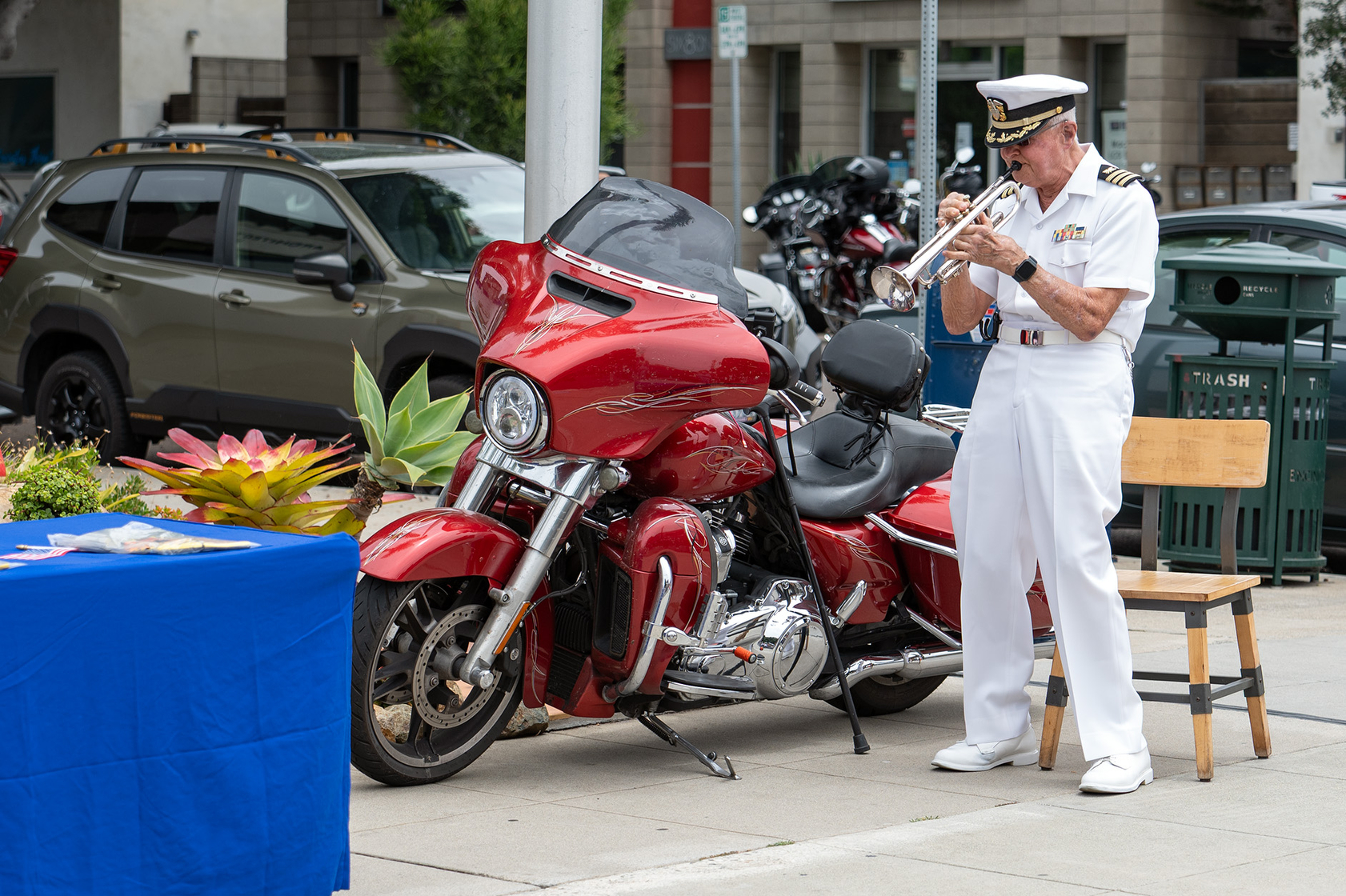 US Navy Cmdr. (Ret.) Ken Carstens performs “Taps” (Jon Clark)