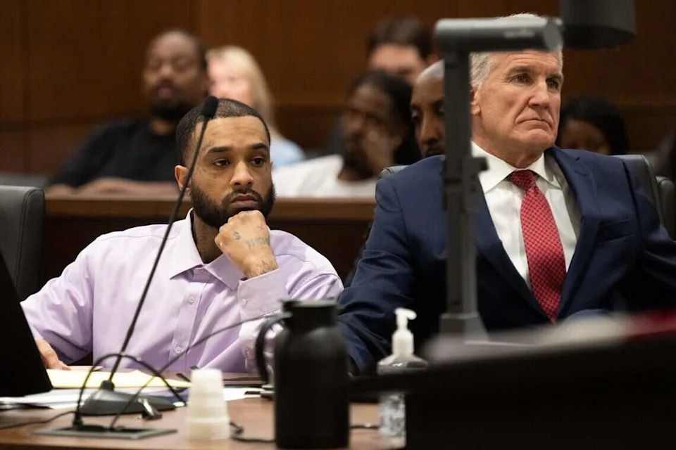 Defense attorney Reid Kingsbury and his client Mtula Payton, who is accused of murder in the April 2022 K Street mass shooting, listen to defense attorney Linda Parisi during closing arguments at Sacramento Superior Court on Wednesday, June 24, 2026, in Sacramento.