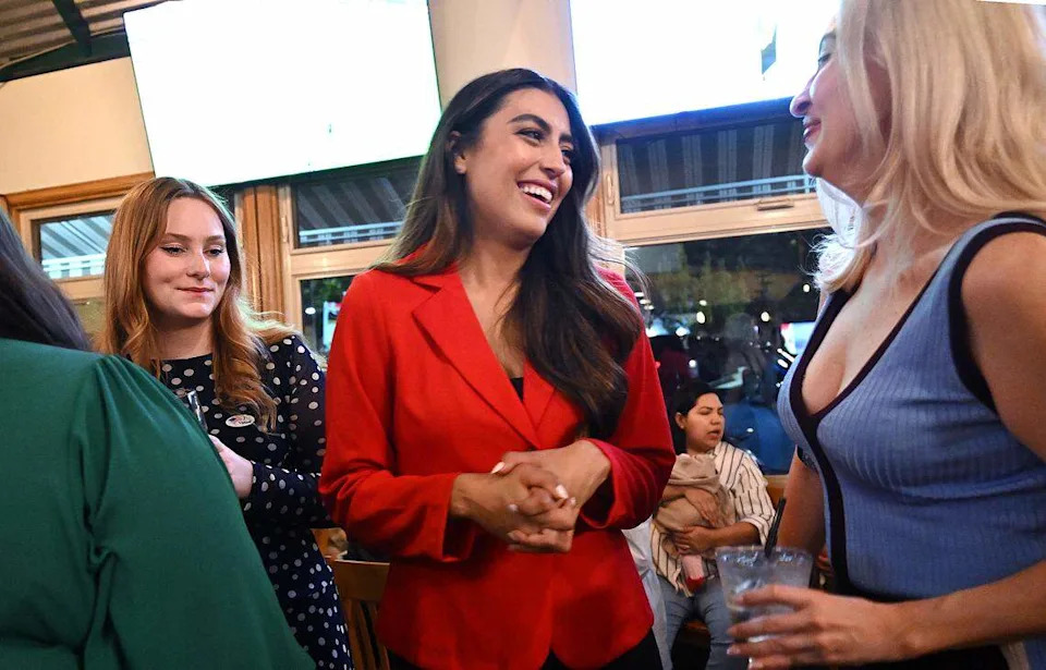 District 5 candidate Danielle Parra, center, is seen at a campaign gathering at Sequoia Brewing in the Tower District Tuesday night, June 2, 2026 in Fresno.