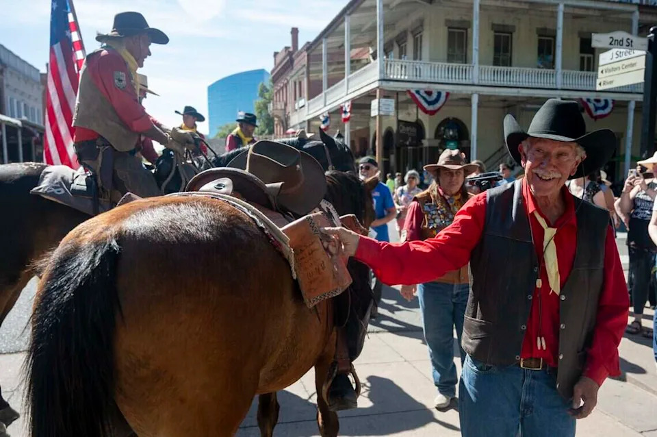 Fred Leslie, president of the National Pony Express Association, closes a cantina on a saddle after riders arrived in Old Sacramento — their last stop of the annual ten-day Pony Express re-ride across the United States — on Thursday, June 25, 2026.