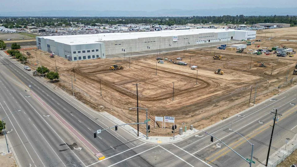A giant warehouse is shown under construction on the northeast corner of Marks and Nielsen in west Fresno. The project, which was proposed more than five years ago, will result in three warehouse buildings totaling more than 800,000 square feet.