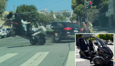 Graphic footage shows driver flung from three-wheeler after smashing into Audi at San Francisco intersection