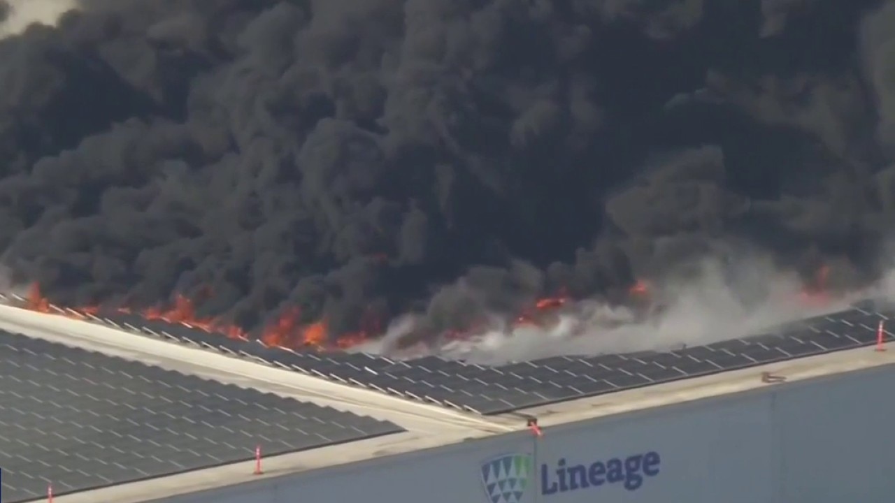 Flames shoot out of Boyle Heights warehouse
