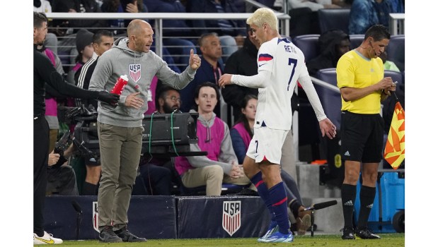 U.S. head coach Gregg Berhalter talks with midfielder Gio Reyna during a 2023 exhibition match against Ghana in Nashville, Tenn. (AP Photo/George Walker IV)