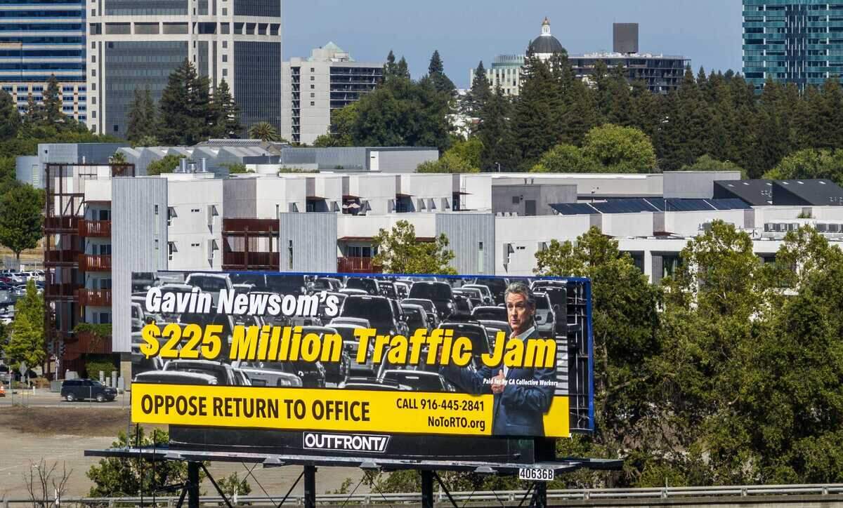 A billboard opposing Gov. Gavin Newsom's return to office order stands in West Sacramento on June 4 along the Capital City Freeway. State worker unions continue to oppose the four day in office requirement as many employees seek alternatives to longer commutes and higher parking costs.