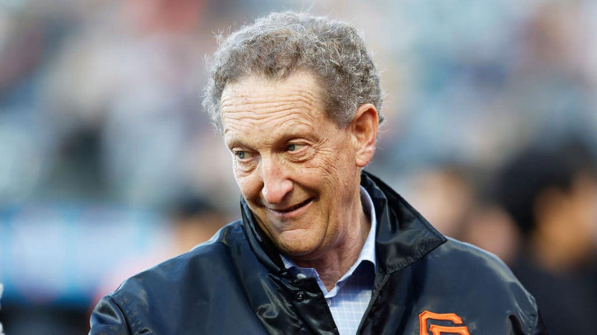 Larry Baer standing and looking on at Oracle Park in San Francisco
