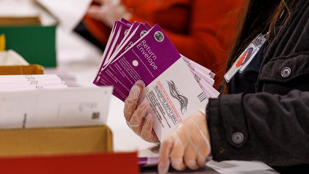 Vote by mail ballots being inspected at Los Angeles County Ballot Processing Center