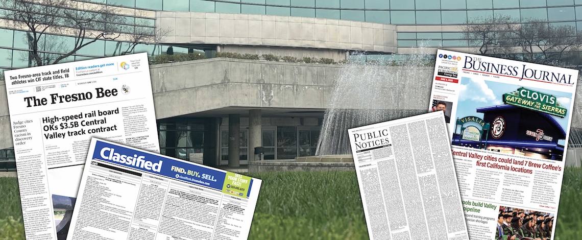 a city hall with newspaper issues in front