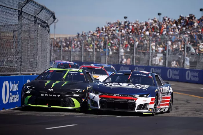 Riley Herbst, 23XI Racing, Kyle Larson, Hendrick Motorsports