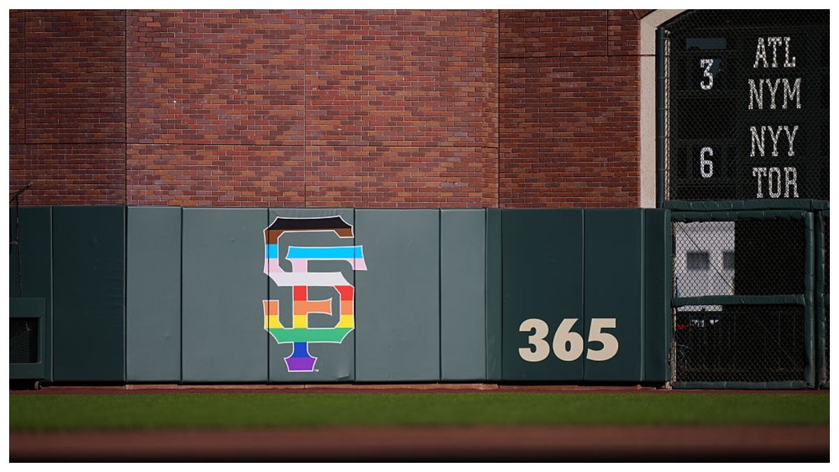 San Francisco Giants Pride Night logo on a display.