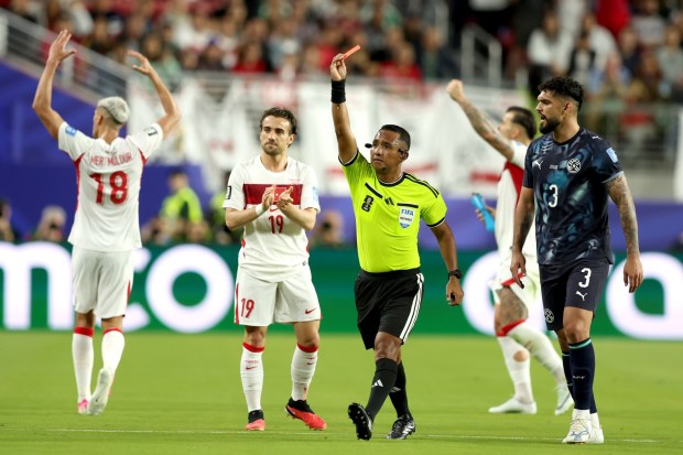 eferee Iván Barton shows the red card to Paraguay's Miguel Almiron (10) during the first half of a FIFA World Cup match against Turkey at Levi's Stadium on Friday, June 19, 2026. (Ray Chavez/Bay Area News Group)