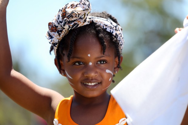 Nahla Dew, 4, performs with other children with the West African Dance group during the Cooper Family Foundation's annual Juneteenth celebration at Memorial Community Park in Logan Heights in San Diego on Saturday, June 20, 2026. (Hayne Palmour IV / For The San Diego Union-Tribune)