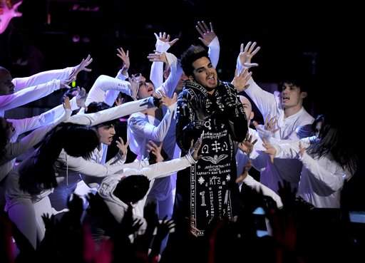 Former San Diego vocal dynamo Adam Lambert is hitting the road to promote his new solo album, "Adam." (Chris Pizzello/Invision/AP)