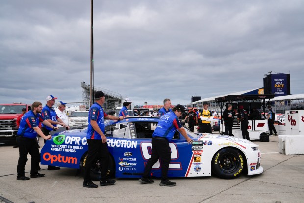 Teams roll their cars from the garage into pit row for practice during the NASCAR O'Reilly Auto Parts Series at NAS North Island on Saturday, June 20, 2026, in NAS North Island, Coronado, CA. (Nelvin C. Cepeda / The San Diego Union-Tribune)