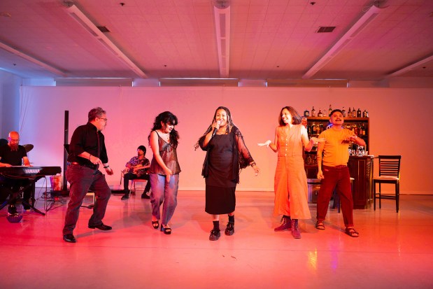 Dave Rivas, left, Cecilia Cuevas-Torres, Jasmine January, Meesha and Wilfred Paloma in OnWord Theatre's "Adult Storytime: A Caregiver's Guide To the Blues." (Bernadette Johnston / Narrative Images Photography)