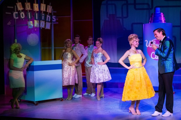 Mikayla Kelley as Amber VonTussel, second from right, and Dennis Peters as Corny Collins in New Village Arts' "Hairspray." (Jason Sullivan)