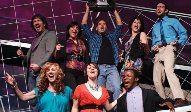 A cast photo from Lamb's Players Theatre's 2011 production of the jukebox musical revue "Mixtape." Pictured front and center in the red blouse is then-Lamb's ensemble member Colleen Kollar Smith, who will take over as Lamb's artistic director on Jan. 1, 2027. (Lamb's Players Theatre)
