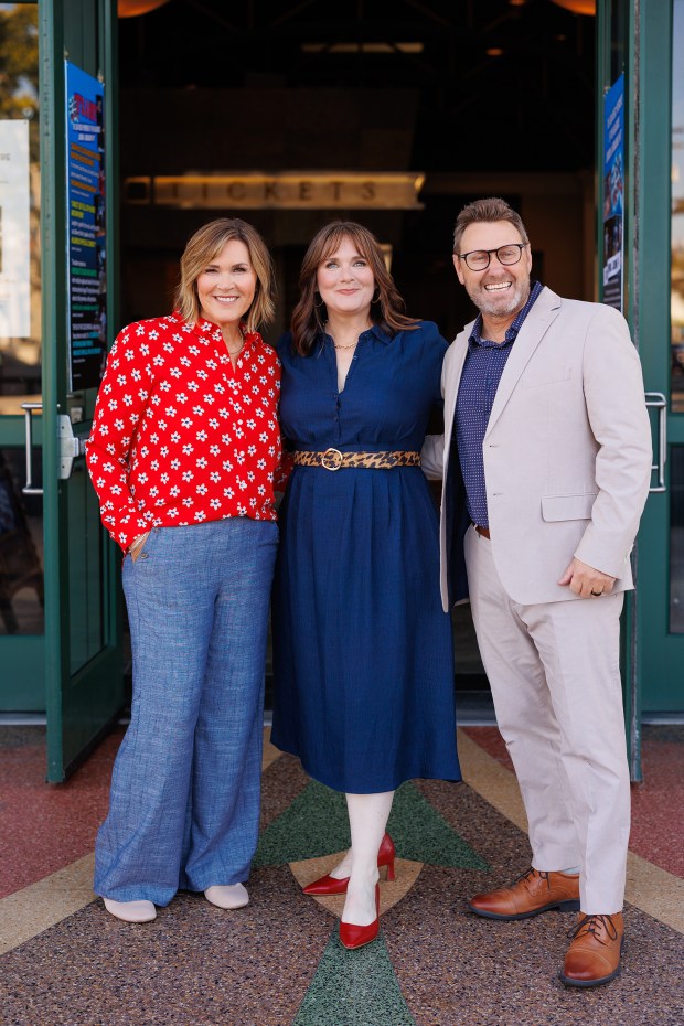 The new leadership team for Lamb's Players Theatre beginning Jan. 1, 2027, are, left to right, Chief Philanthropy and Administration Officer Jennifer Bradford, left, Artistic Director Colleen Kollar Smith and Chief Financial and Operations Officer Mike Bradford. (Michael Pearce)