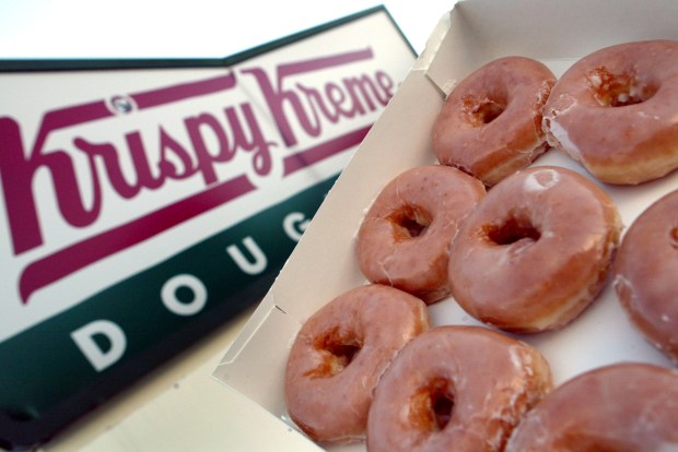 Krispy Kreme locations are giving away one free doughnut to every customer on Friday in honor of National Donut Day. (Getty Images)